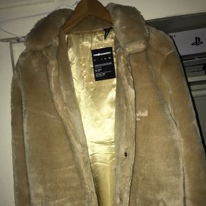 I am selling a mink coat by “TheHundreds”